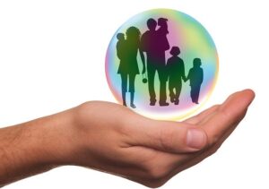 Image of palm holding silhouette of a family, representing how an insured's expectations of indemnity include an insurer's duty of good faith to unnamed insureds.